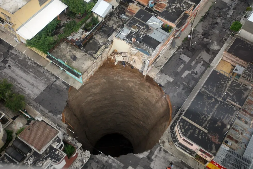 Massive Crater, sink hole, after tropical storm in Guatemala.