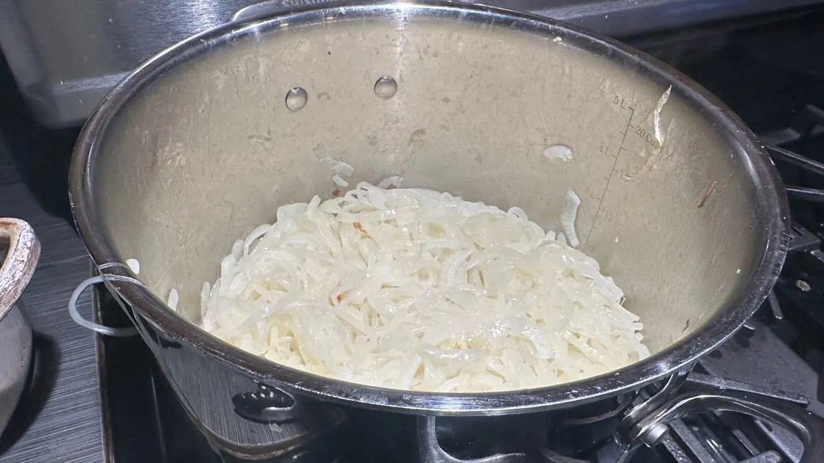 The onions collapsed to a soft translucent pile in the bottom of a tall pot